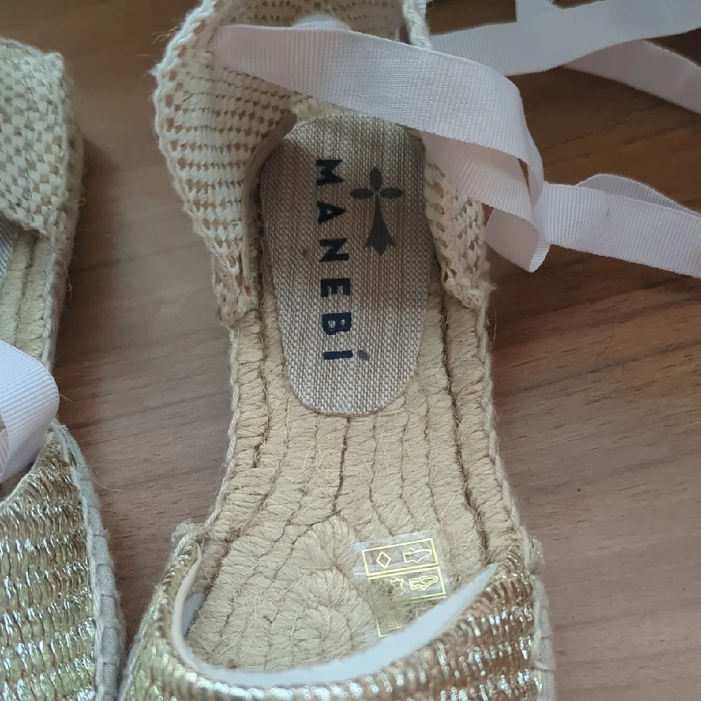 Manebi Elegant Gold Espadrille Flats with Ribbon Accents
